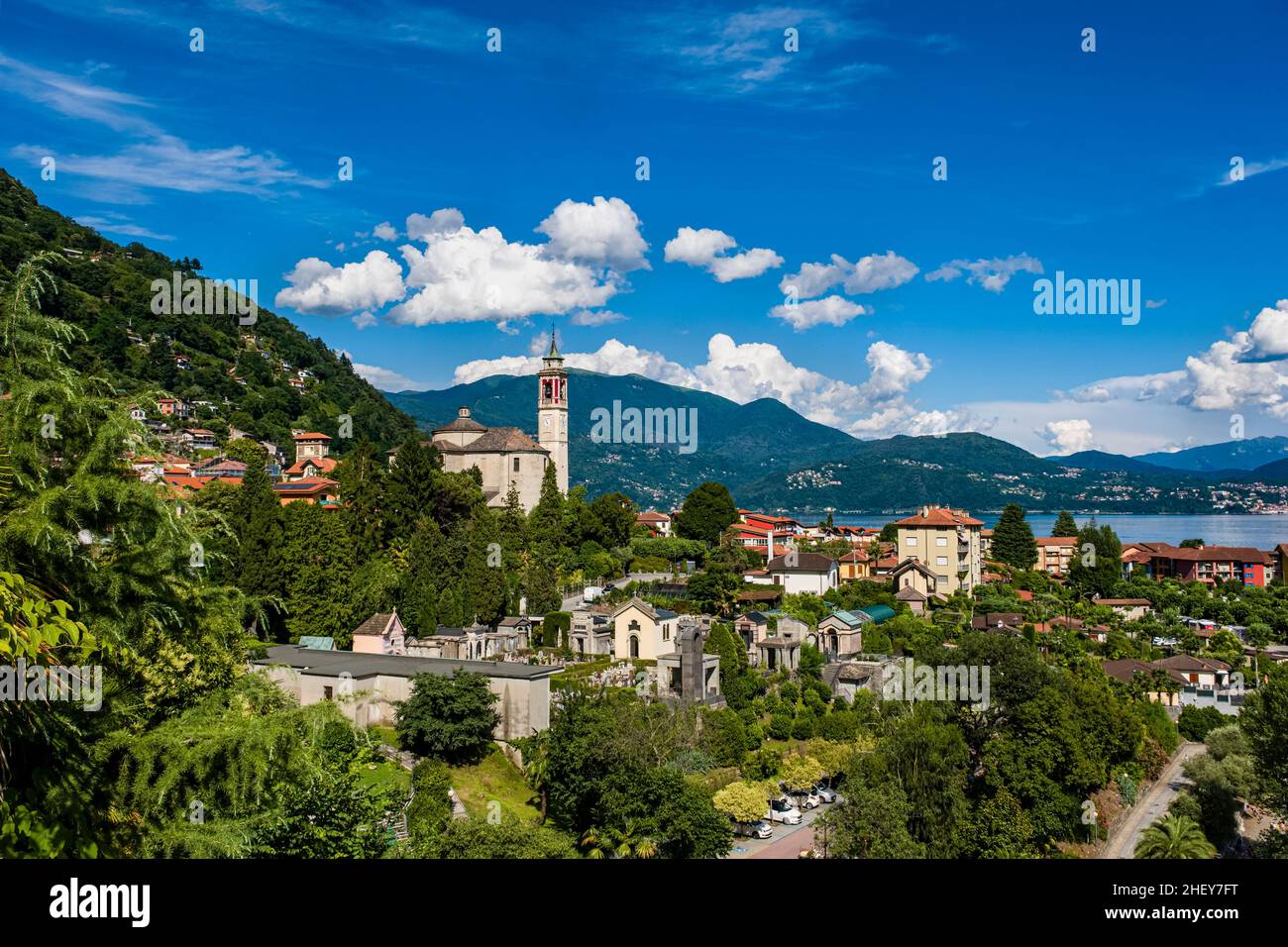 View of Cannero, the church Chiesa Parrocchiale di San Giorgio, Lake Maggiore and the surrounding mountains. Stock Photo