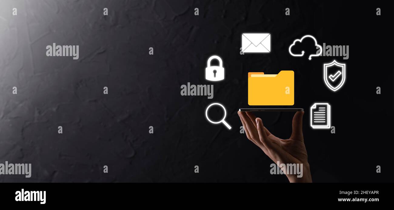 Document Management System DMS .Businessman hold folder and document ...
