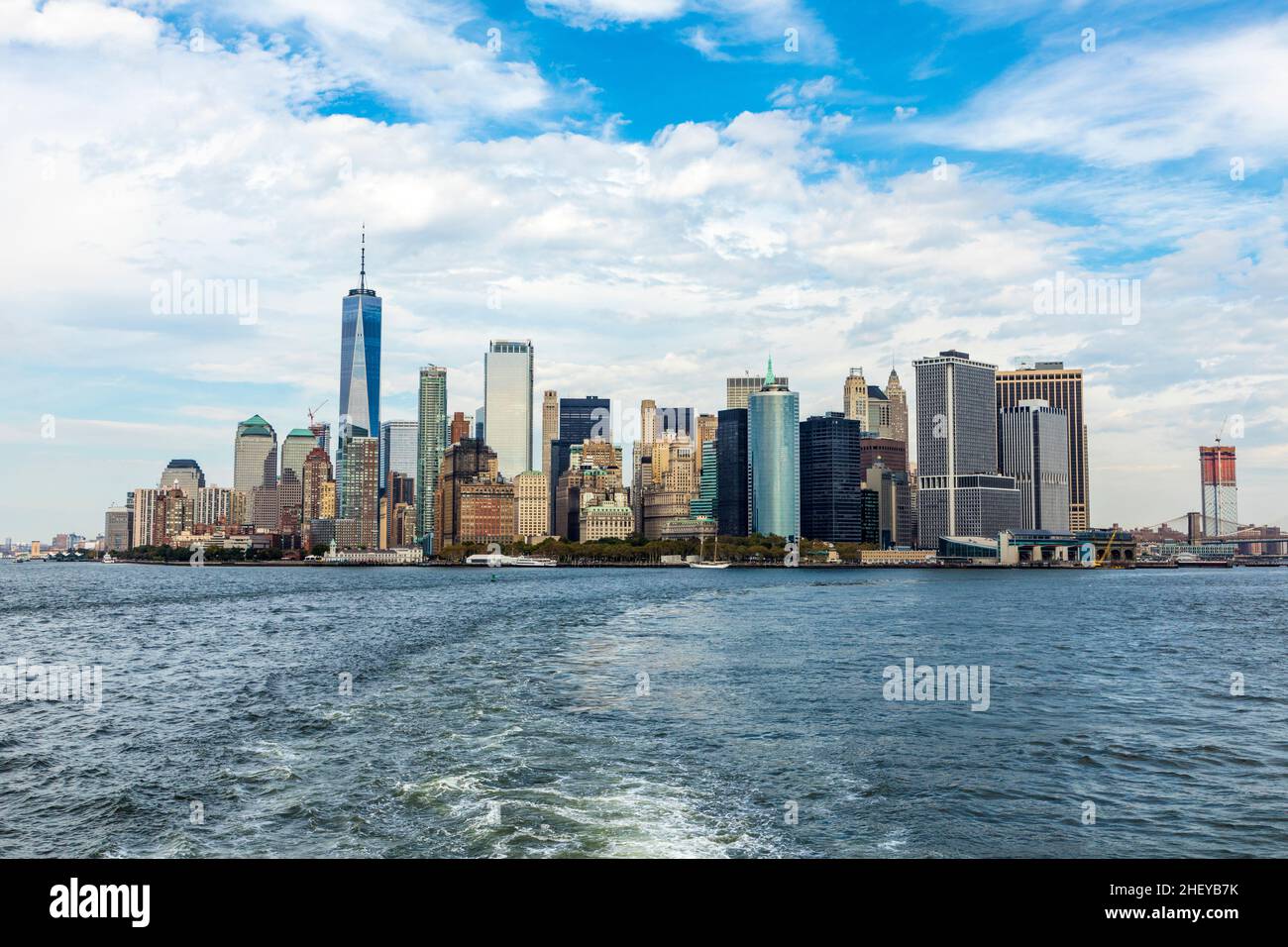 skyline of new york under blue cloudy sky Stock Photo - Alamy