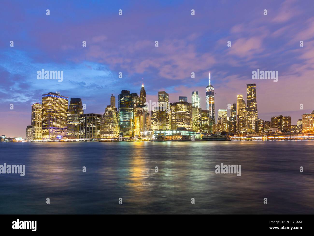 panoramic view to New York by night with Hudson river Stock Photo - Alamy