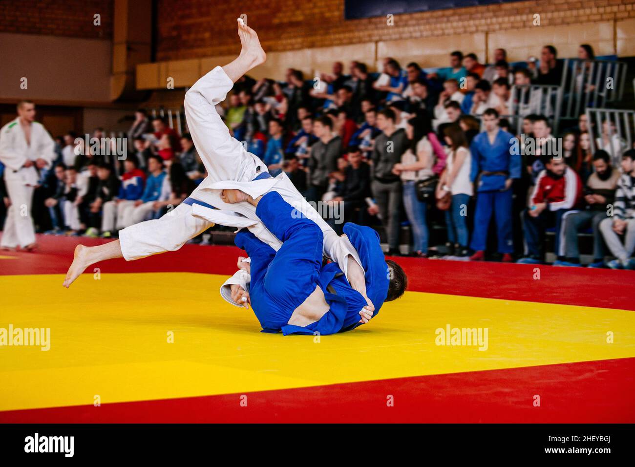 throw judo fighter in competition judo Stock Photo