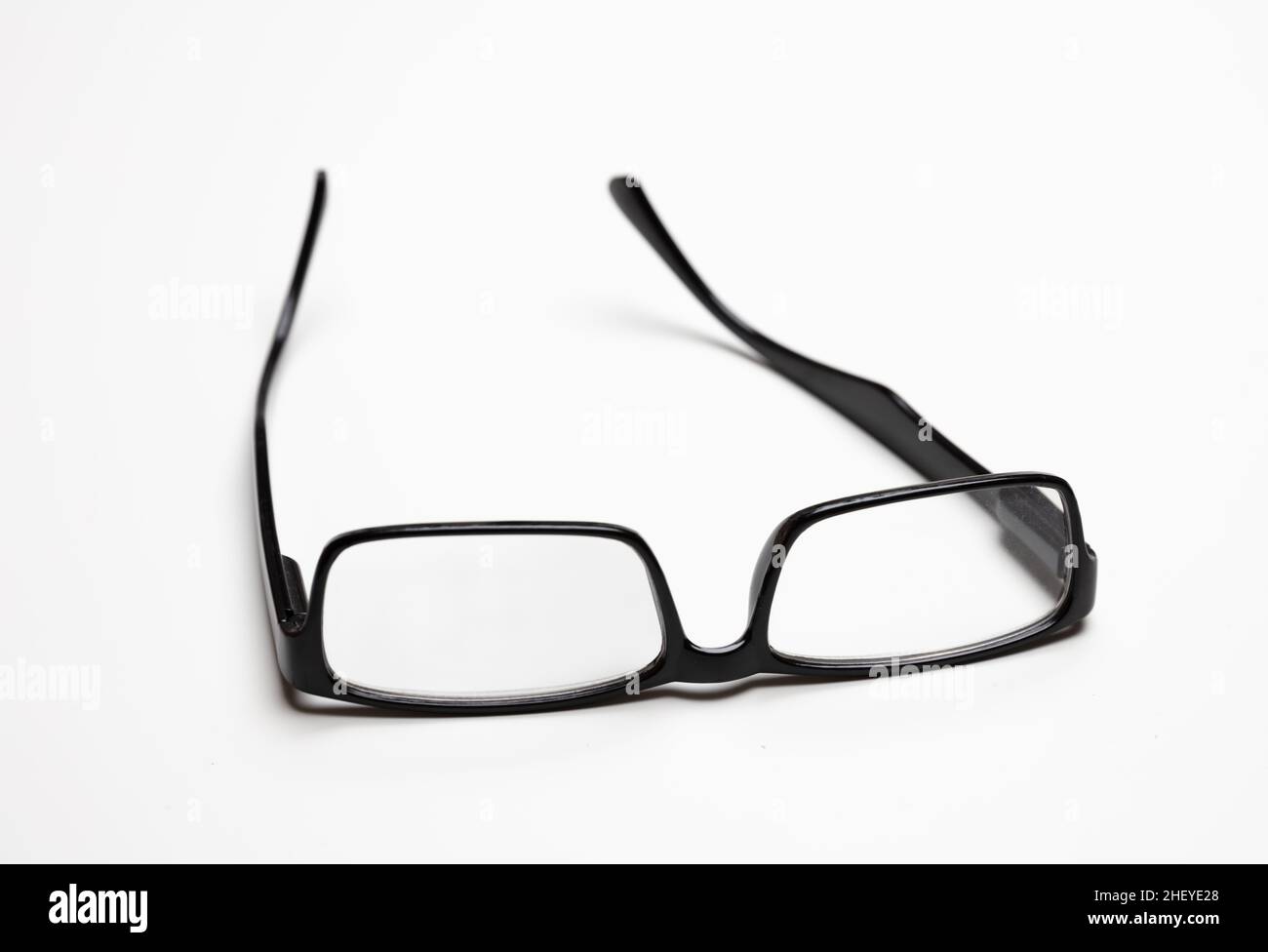 Eyeglasses or spectacles for vision correction. Myopia, presbyopia black frame eye glasses isolated cutout on white background. Stock Photo