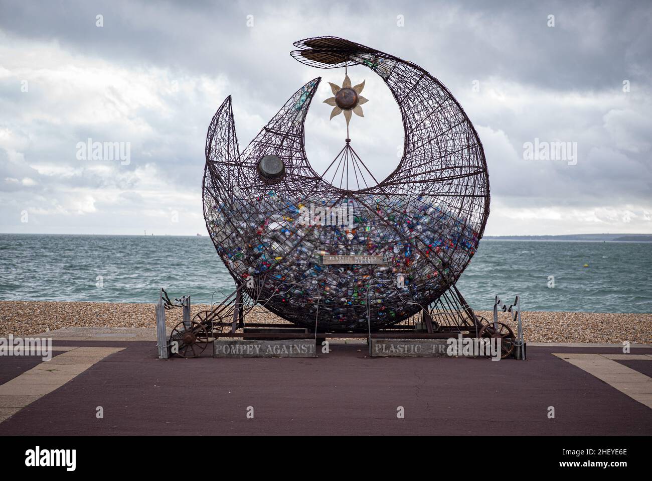 Symbolic large fish shaped plastic recycling initiative on Southsea promenade, opposite the Isle of Wight Stock Photo