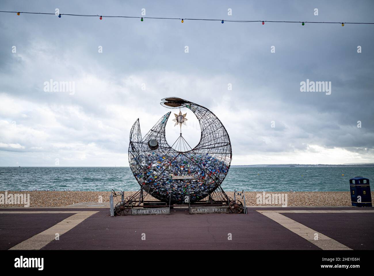 Symbolic large fish shaped plastic recycling initiative on Southsea promenade, opposite the Isle of Wight Stock Photo