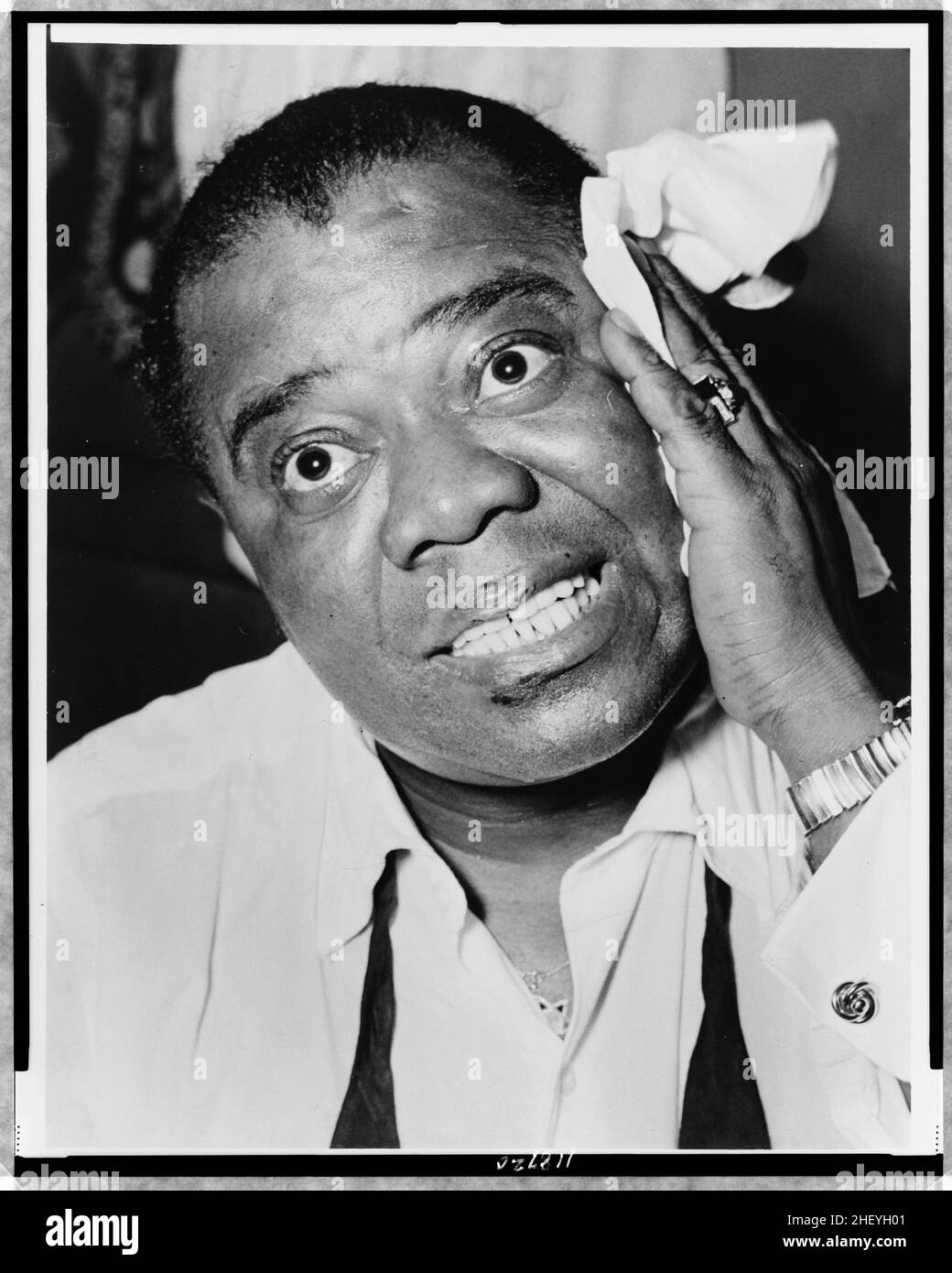Louis Armstrong in 1953, head-and-shoulders portrait / World Telegram & Sun photo by Herman Hiller Stock Photo