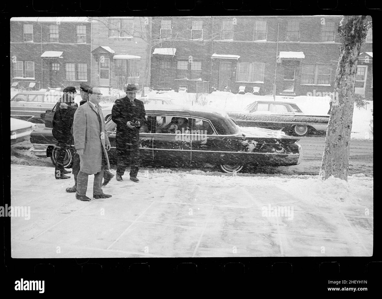The Beatles arriving in the snow storm. 1964 February 11. Trikosko, Marion S., photographer. The Beatles’ first US concert, Washington Coliseum. Stock Photo
