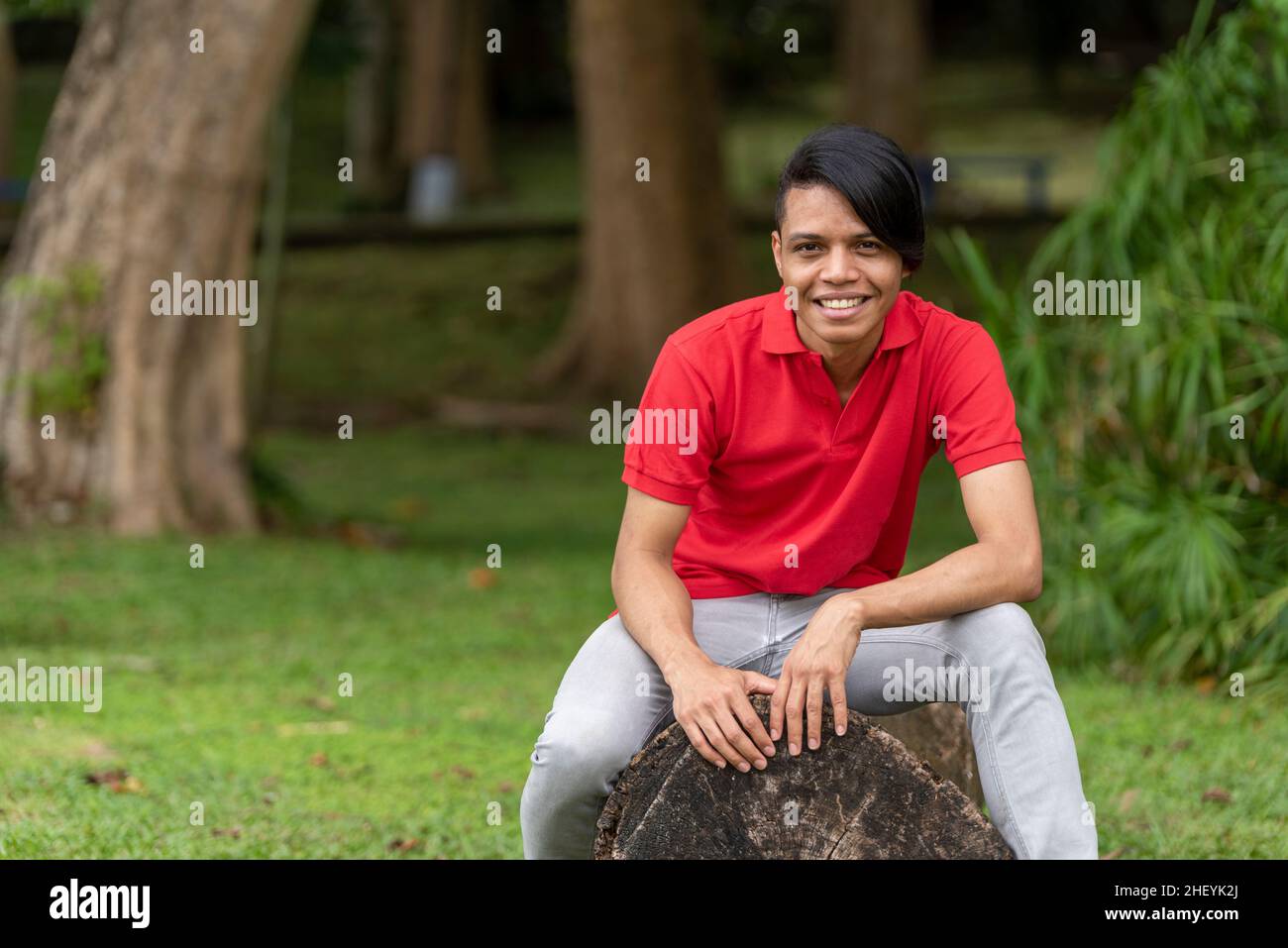Portrait of young latin man in a public park, Panama Stock Photo