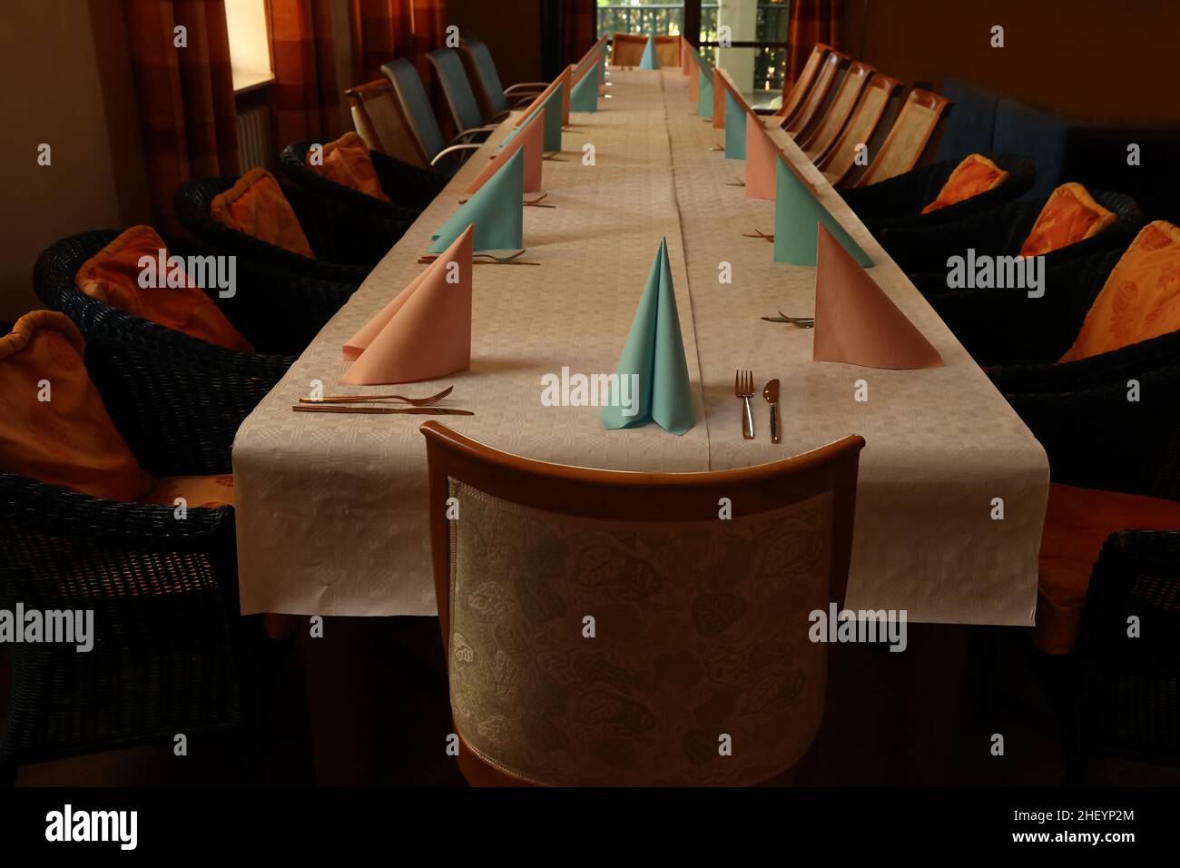 Simple table setting in a restaurant for the holiday. Stock Photo