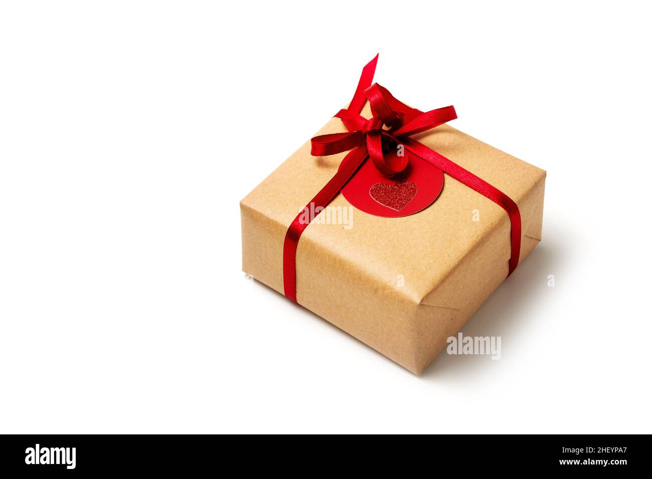 Elegant design of present gift box wrapped in brown craft paper with ...