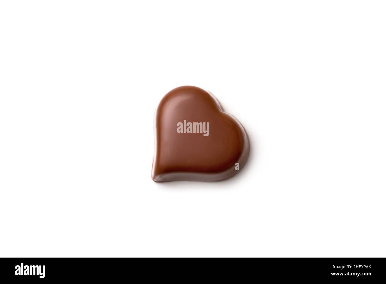 Chocolate heart-shaped candy on white background, Saint Valentine day Stock Photo