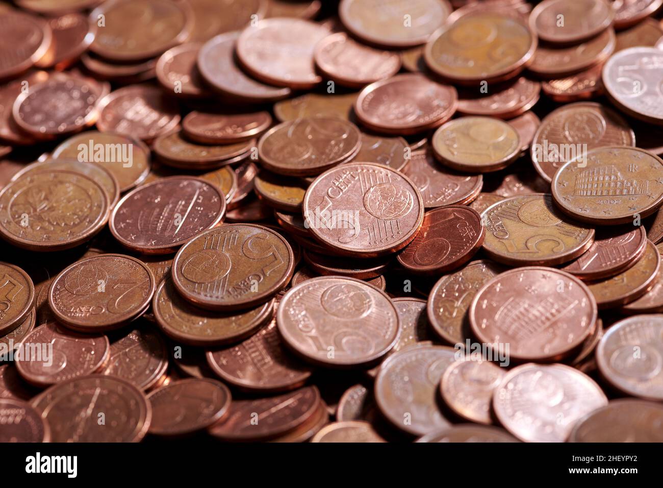 Closeup bunch of euro cent coins of various value placed in heap in bank storage Stock Photo
