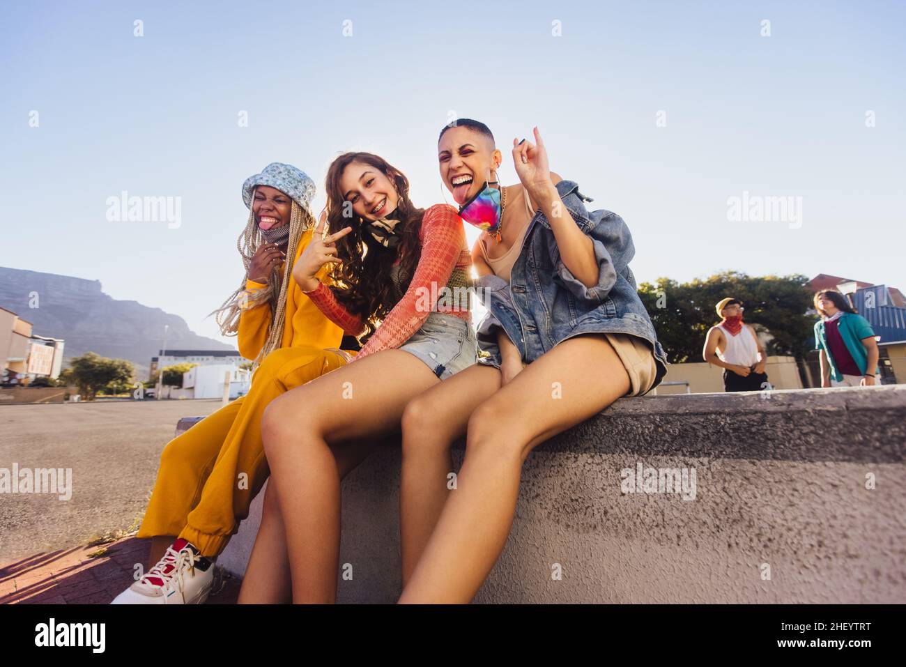 Girls having a good time outdoors. Group of happy female friends ...