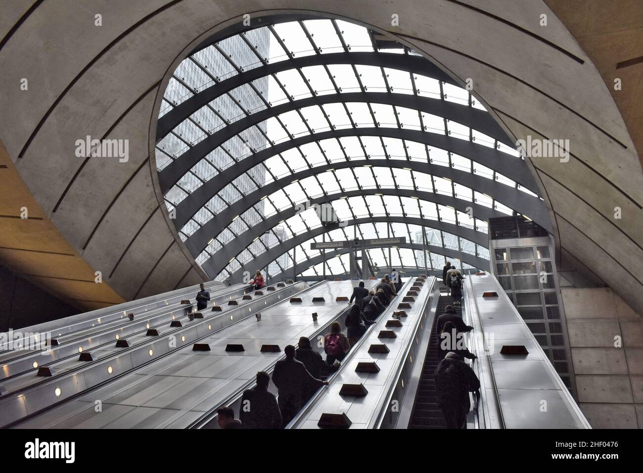 Canary Wharf underground station escalators and curved glass roof over