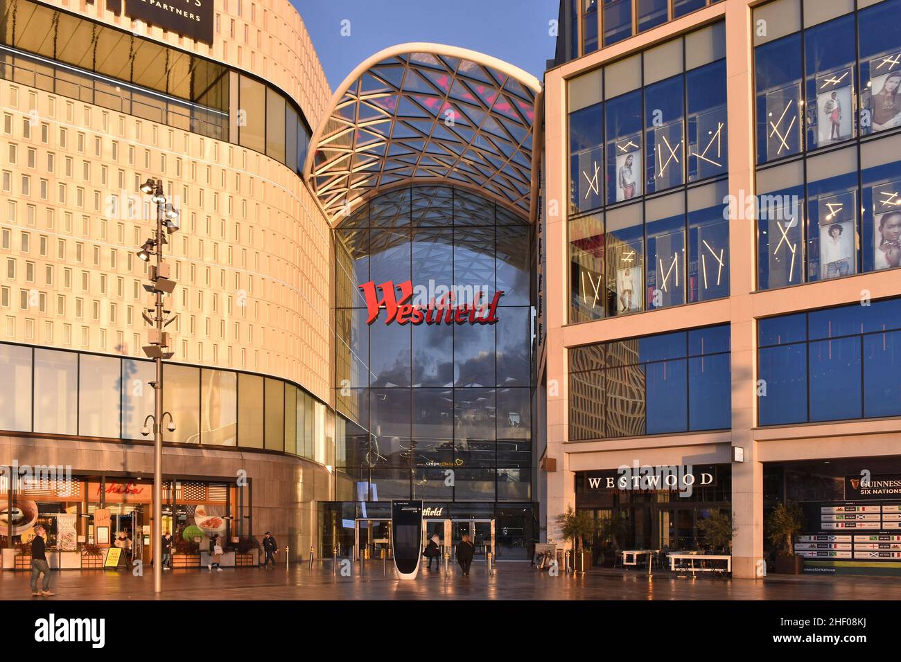 Westfield White City modern shopping center building exterior, west