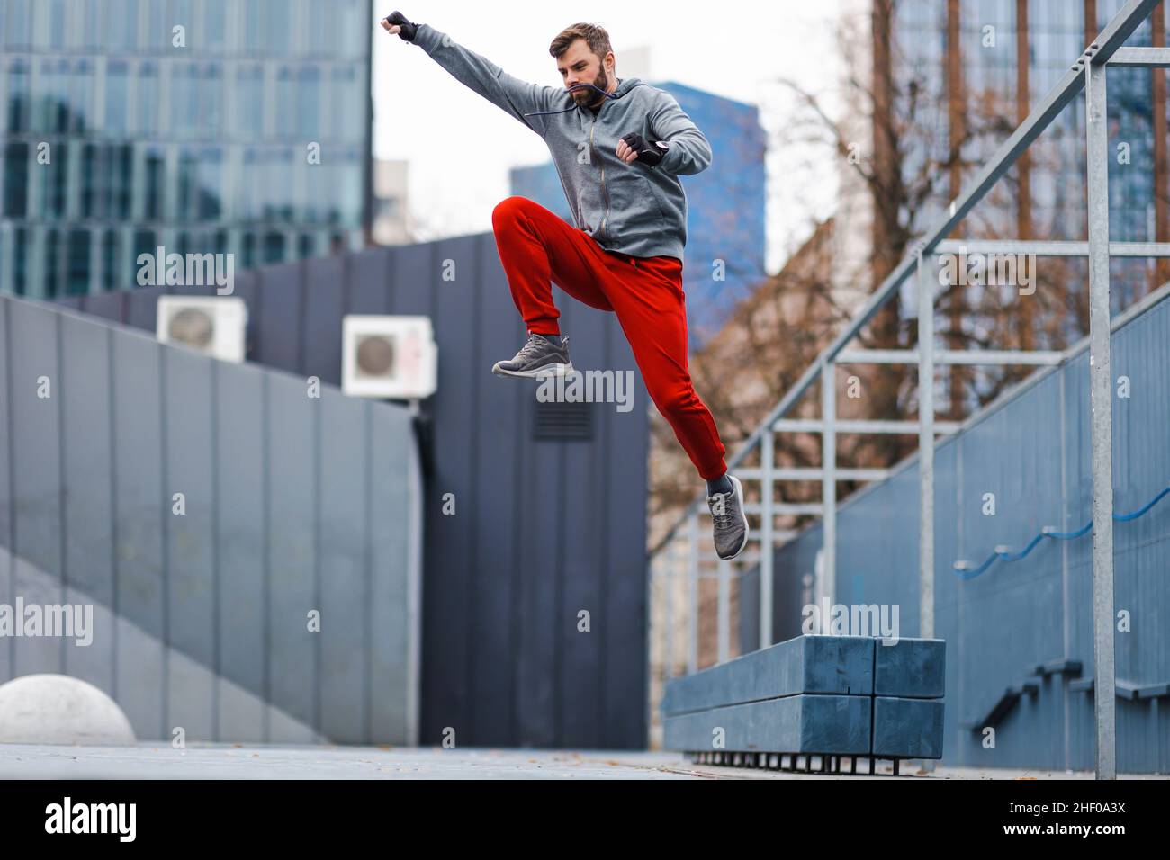 Man practicing parkour in the city Stock Photo