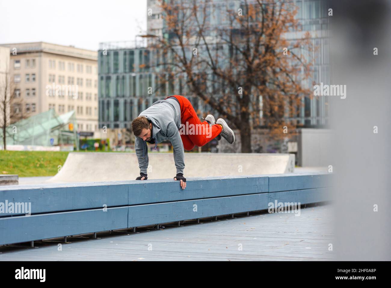 Man practicing parkour in the city Stock Photo