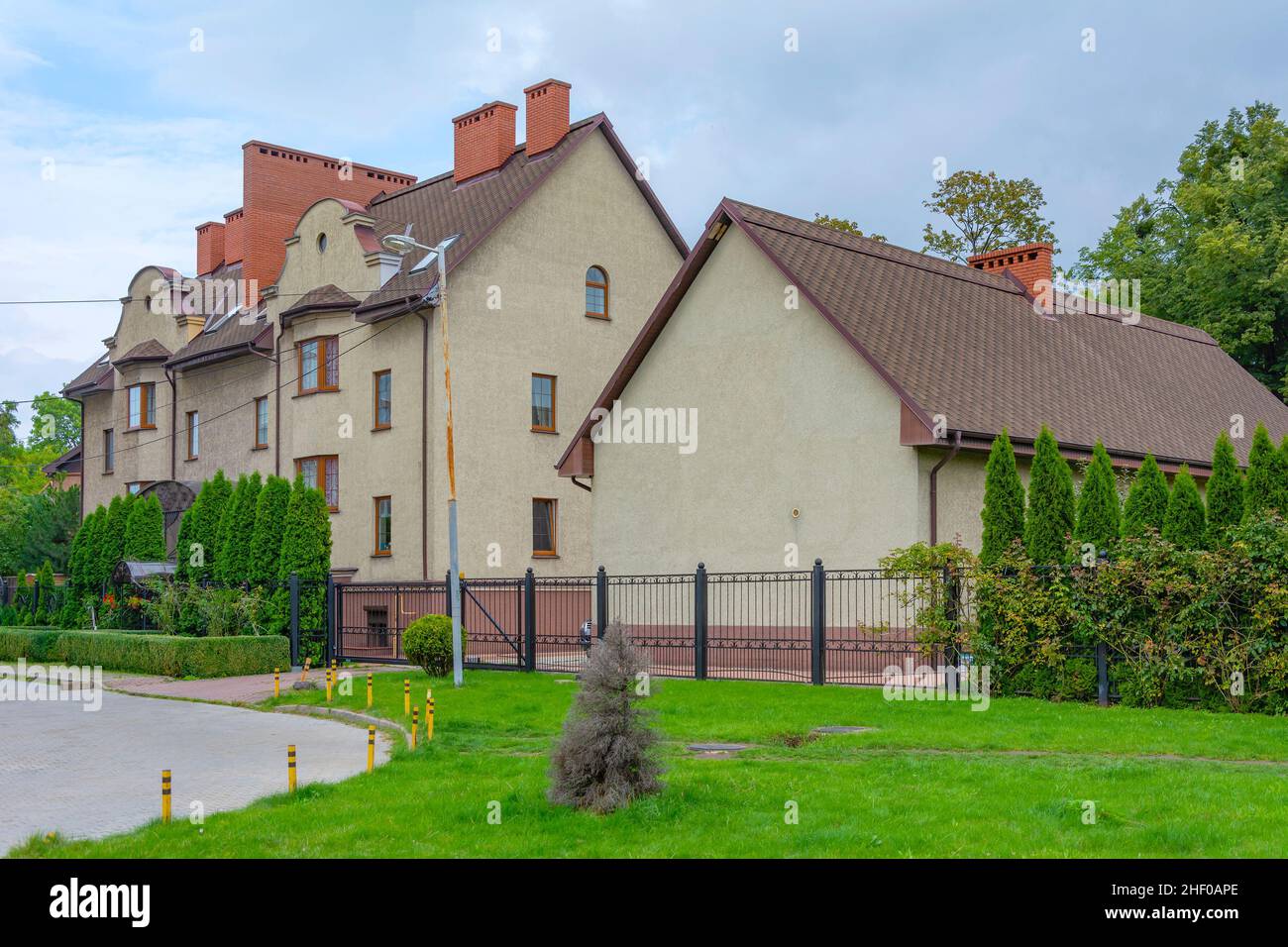 Kaliningrad, a three-storey private residential building with a well-groomed garden plot Stock Photo