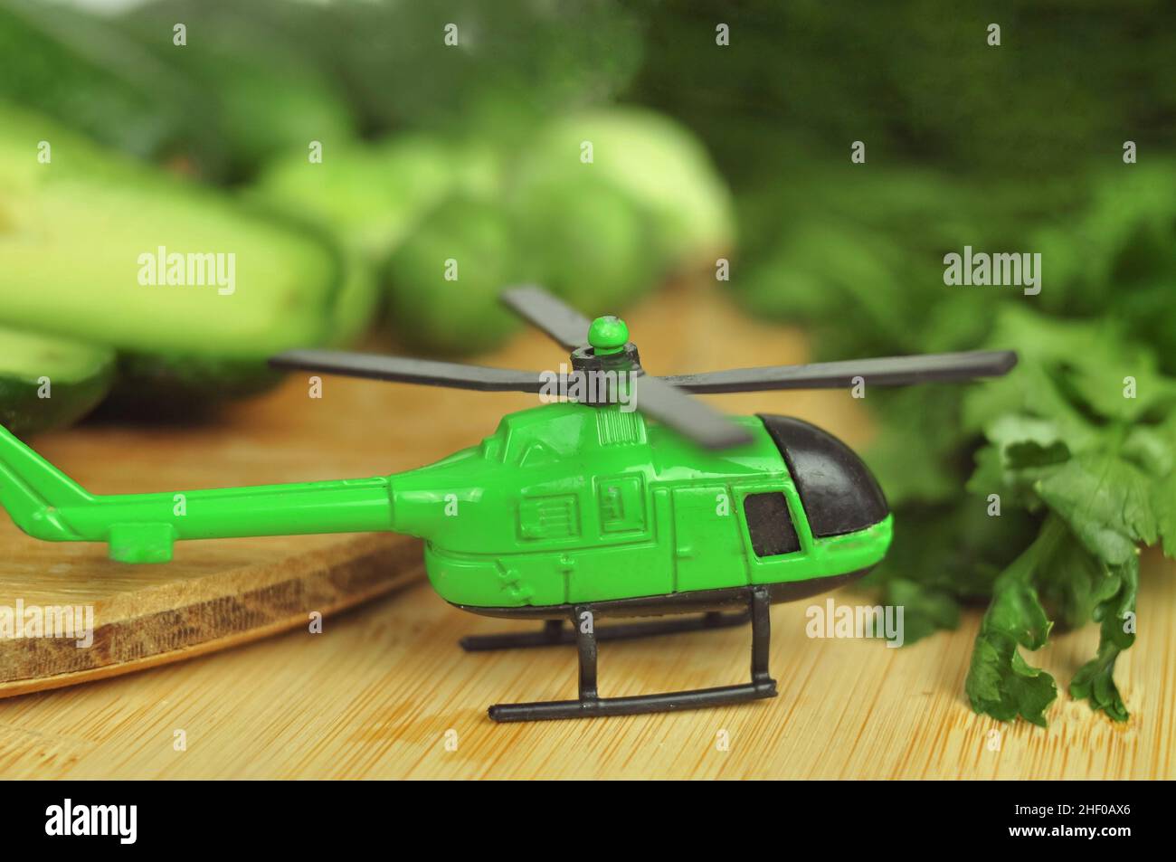 Green helicopter and vegetables import export of healthy food concept. High quality photo Stock Photo