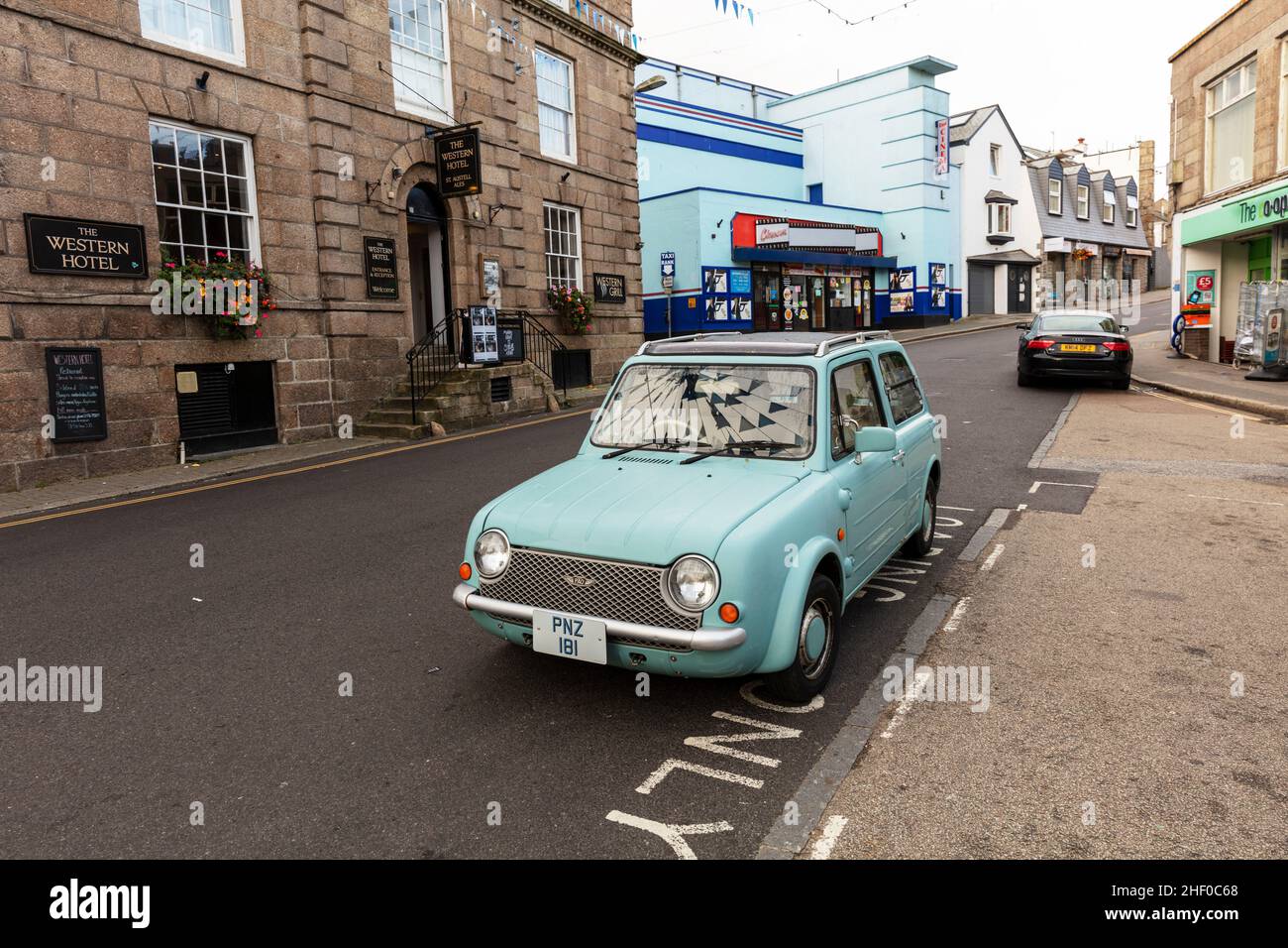 Nissan blue car parked, classic Nissan car, Blue Nissan, classic car, St Ives Cornwall, UK, classic cars, St Ives, Cornwall, England, Stock Photo