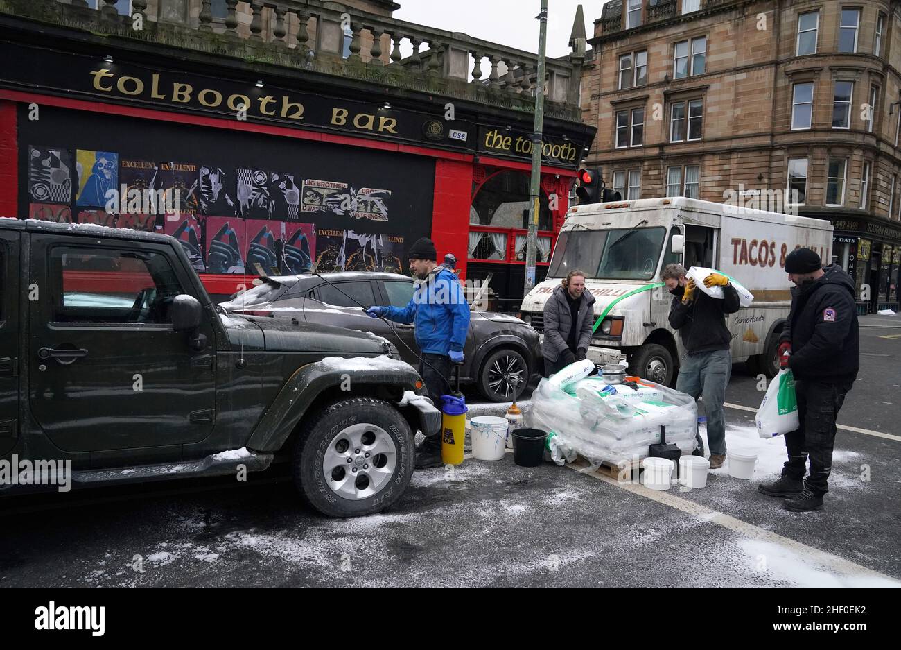 Set Dressers dress the set in Glasgow, for what is believed to be the
