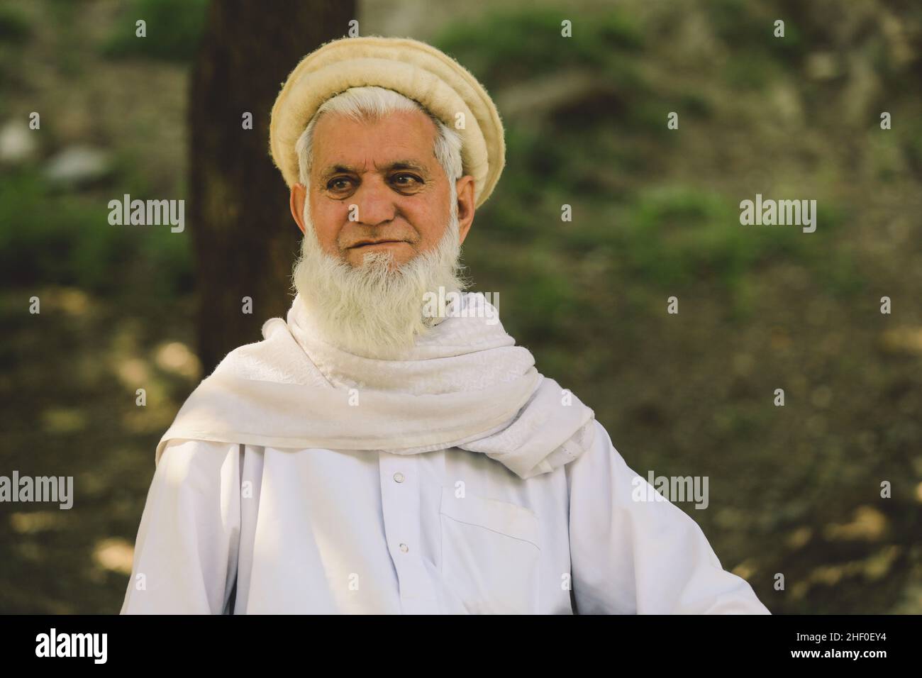 Gilgit, Pakistan June 08, 2020 Old Pakistani Man with White Beard in Traditional Pakol Stock