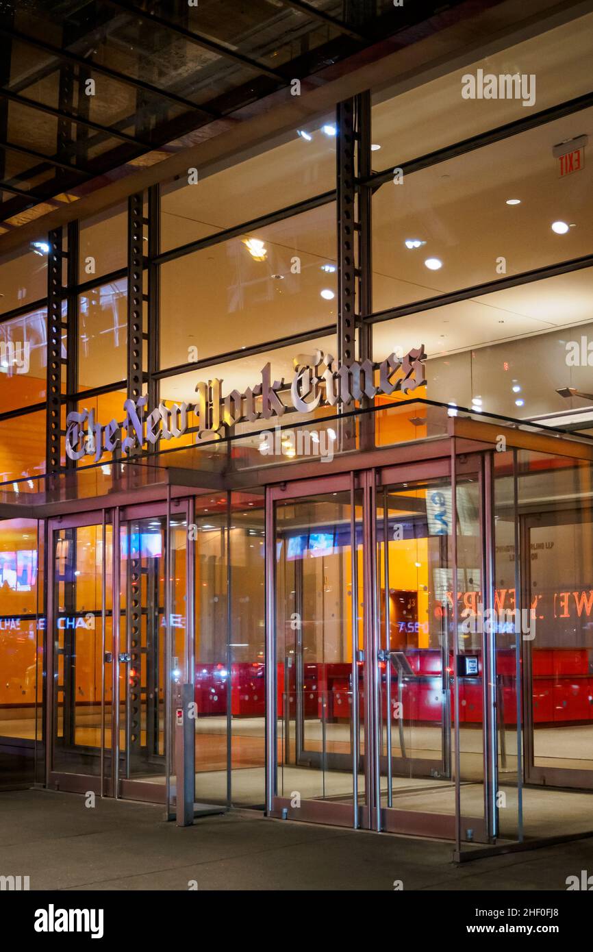 NYC, New York - February 23, 2018 : Main entrance to the famous New York Times building at night in NYC, New York Stock Photo