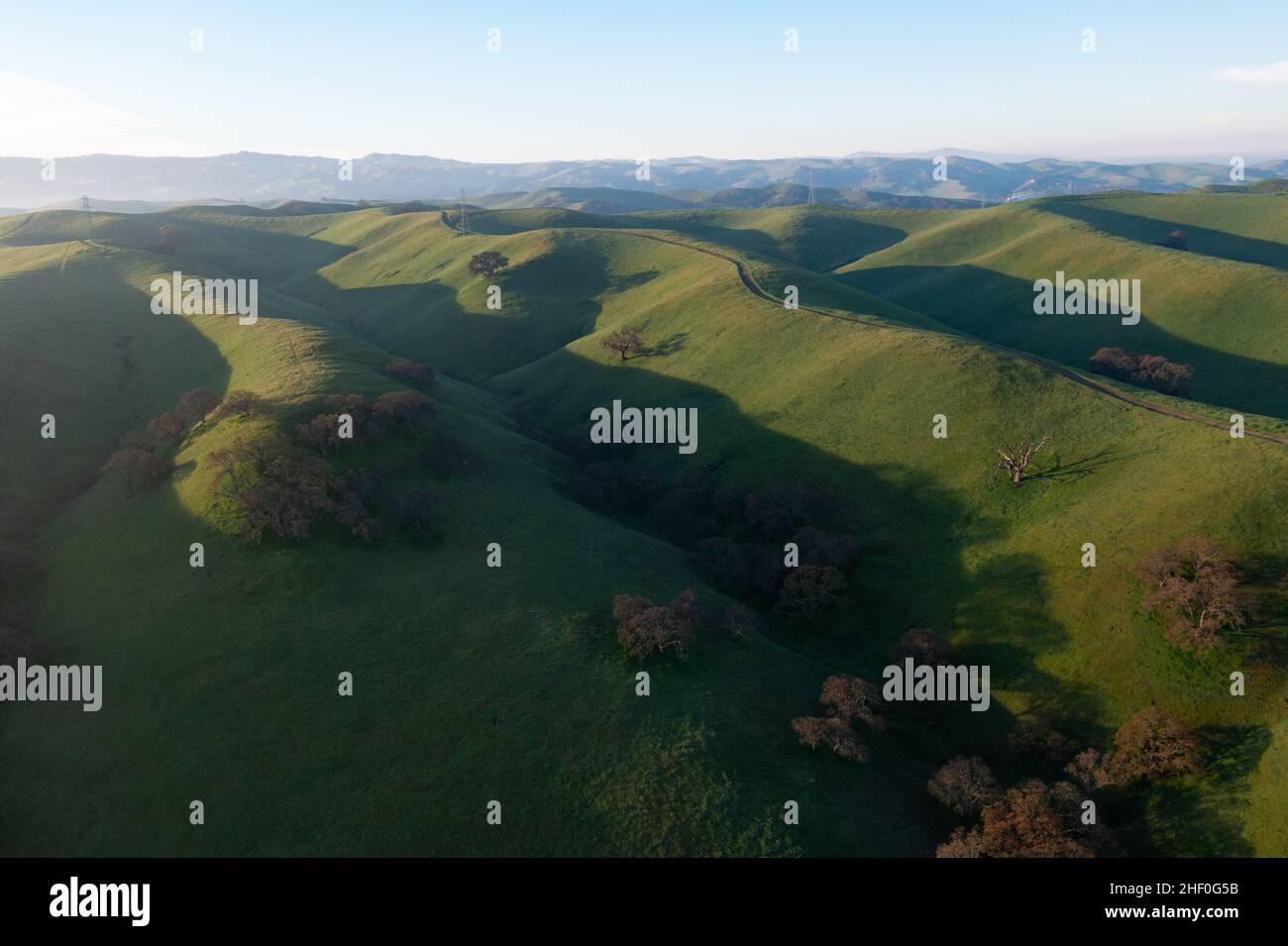 Early morning light shines on the scenic, rolling hills and valleys of the Tri-valley area of Northern California, just east of San Francisco Bay. Stock Photo