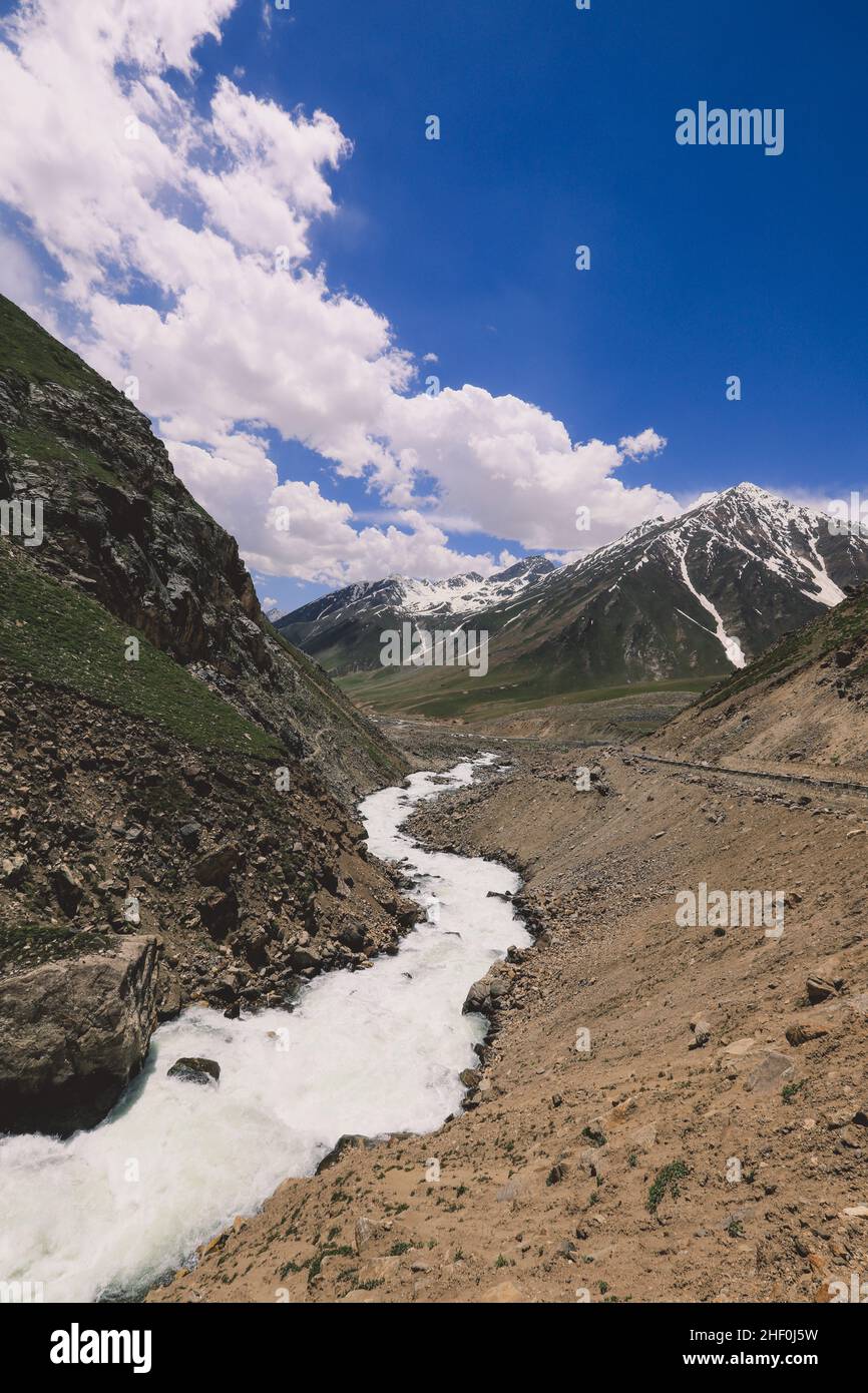 Mountain River in Gilgit Baltistan Highlands under the Blue and Cloudy Sky, Pakistan Stock Photo