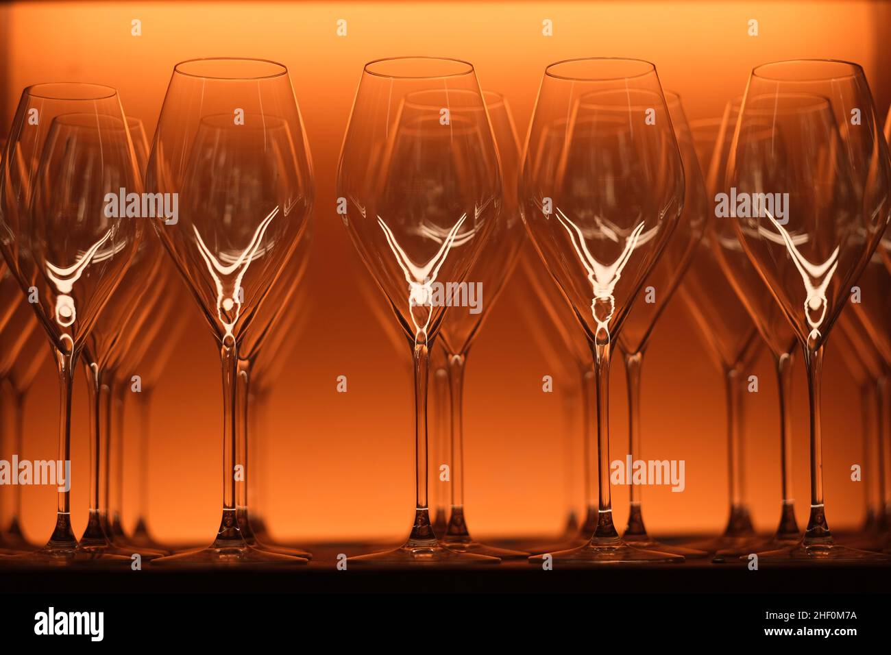 close up many empty drinking glasses in a row. celebration concept Stock Photo