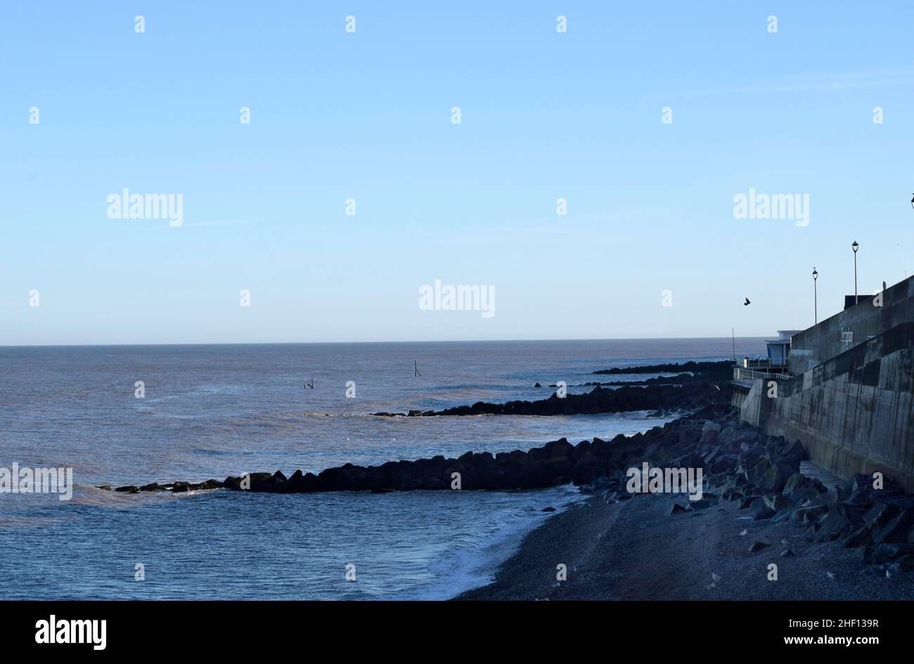 sea view with groins, sheringham, norfolk, england Stock Photo Alamy