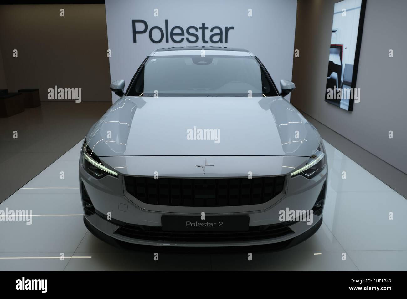Polestar 2 EV inside store. Front view of Polestar 2 electric car. Polestar is a Swedish car brand owned by Volvo Cars and Geely Stock Photo