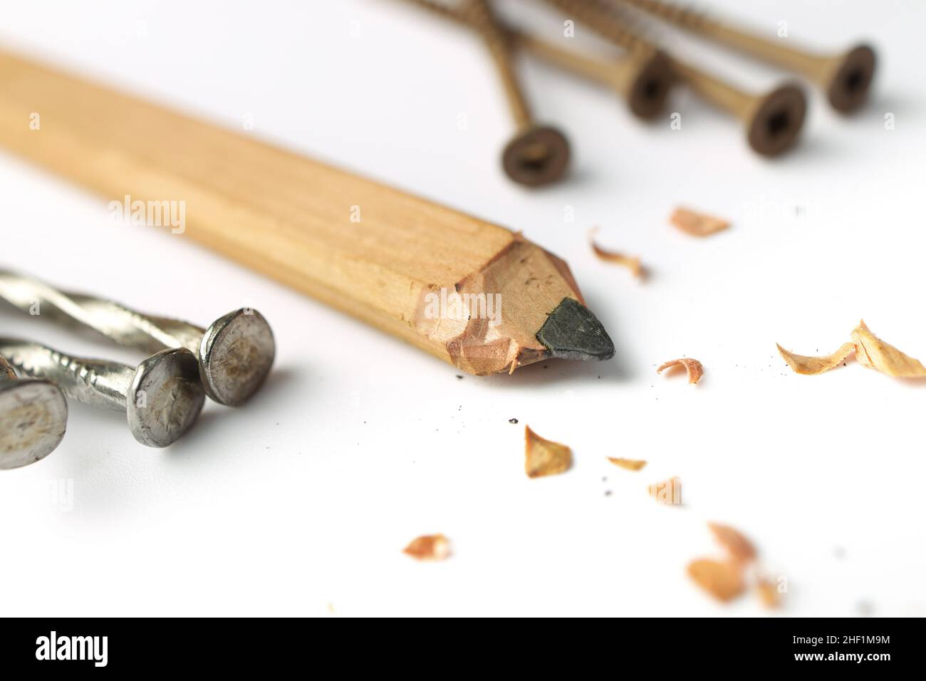 Carpenter's Pencil with Sharpening Shavings, Framing Nails and Deck Screws Stock Photo Alamy