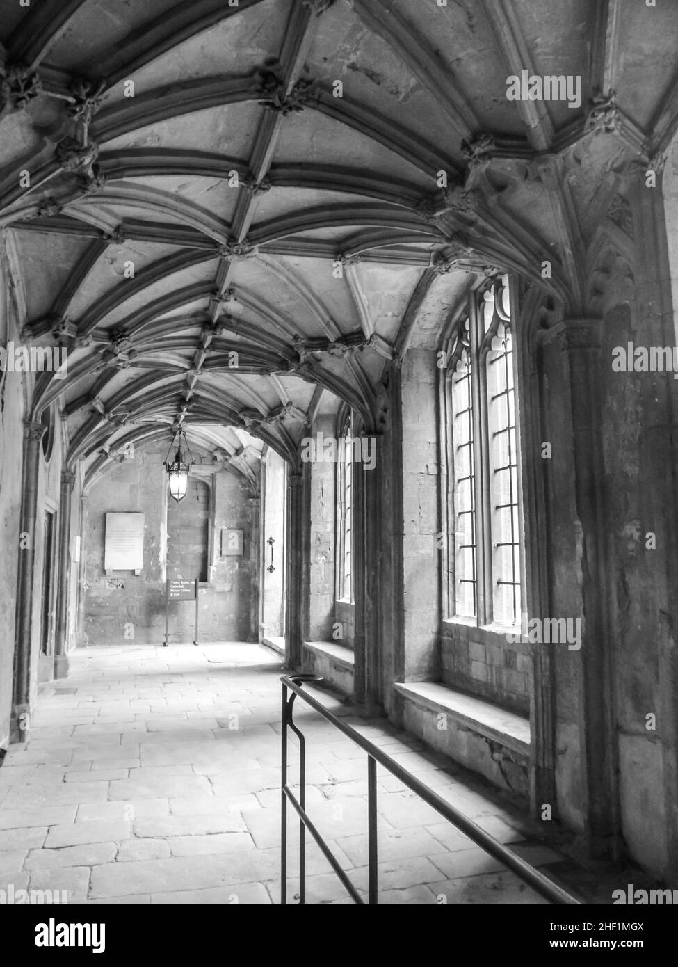 A hallway with a gothic stone ceiling in black and white. Stock Photo