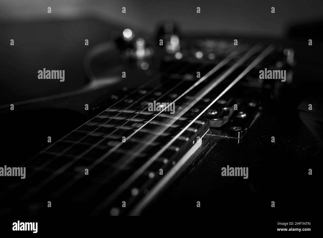 closeup shot of guitar string rattle, selective focus Stock Photo