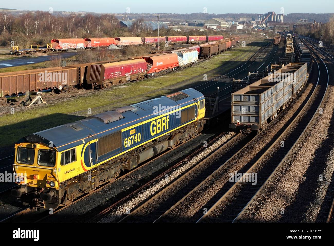 GB Railfreight Class 66 loco 66740 at the tail of the 6G36 0515 Newsham Level Crossing to Scunthorpe infrastructure service at Scunthorpe on 13/1/22. Stock Photo