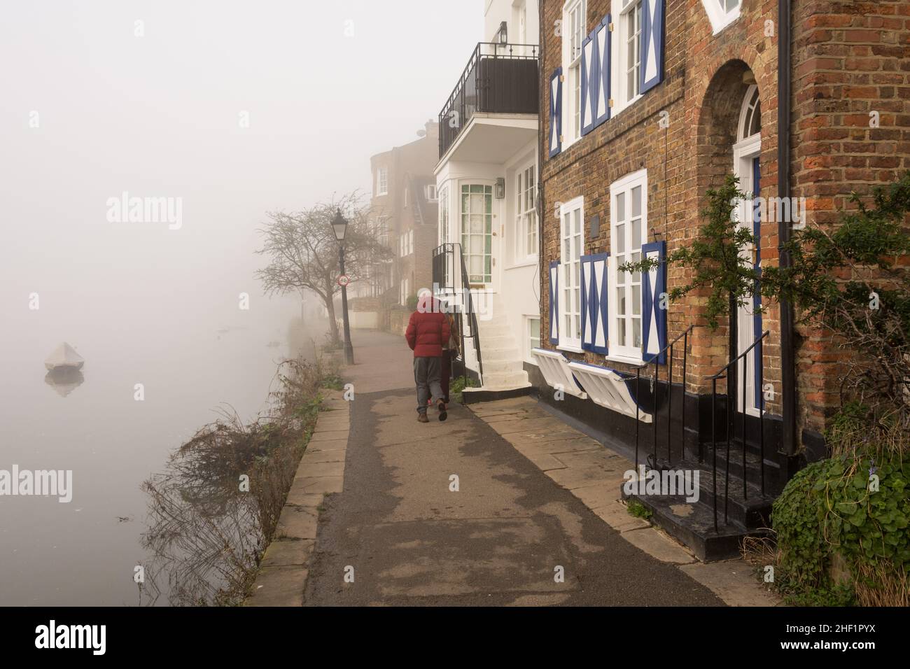 The Dutch House at Strand-on-the-Green, Chiswick, enveloped in dense fog on the banks of the River Thames, London, England, U.K. Stock Photo