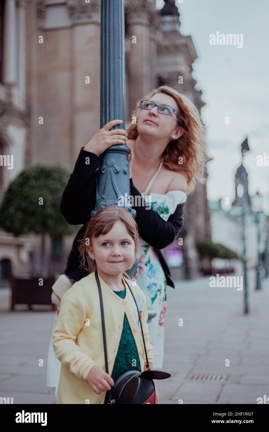 mother and child in the city Stock Photo Alamy