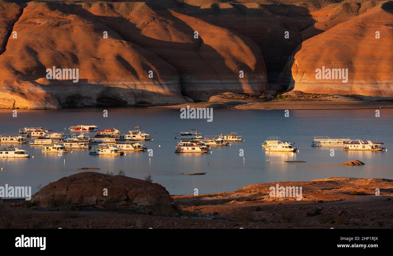 Houseboats at Bullfrog on Lake Powell in Utah, with a prominent