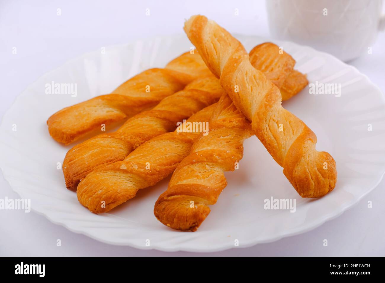Indian khari or kharee or salty Puffy brown Snacks, served with indian hot tea, Indian Breakfast. Stock Photo