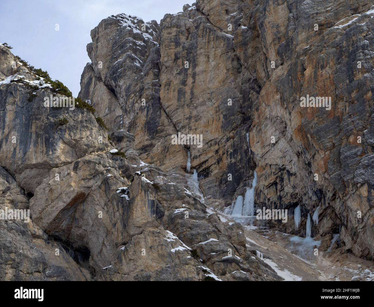 ice on the rock on Fanes mountain dolomites in winter panorama snow