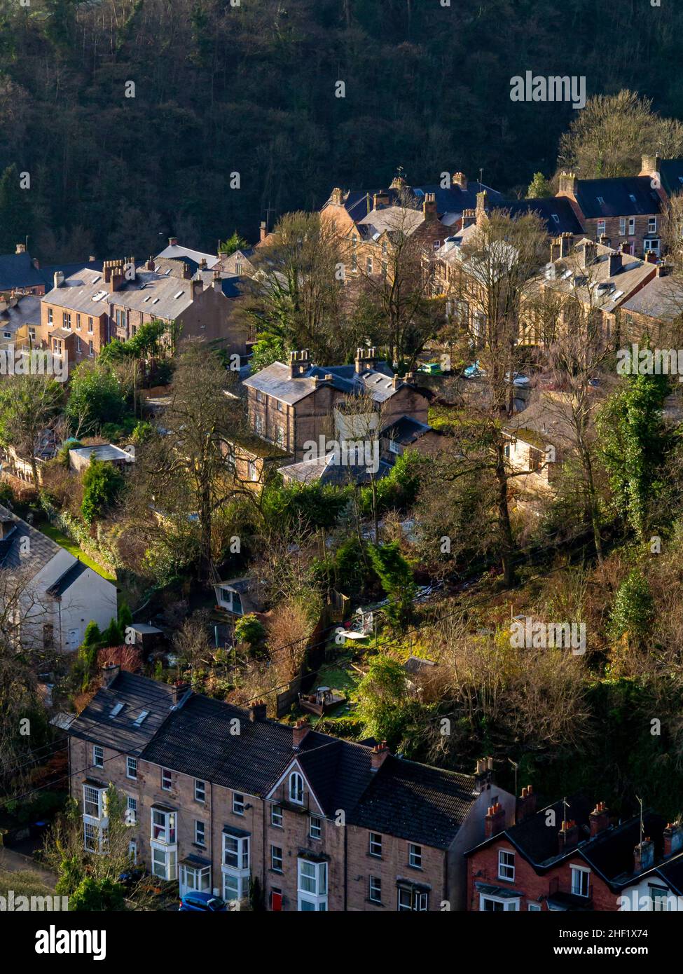 View looking down on rooftops and chimneys in Matlock Bath a village in the Derbyshire Dales area of the Peak District England UK Stock Photo