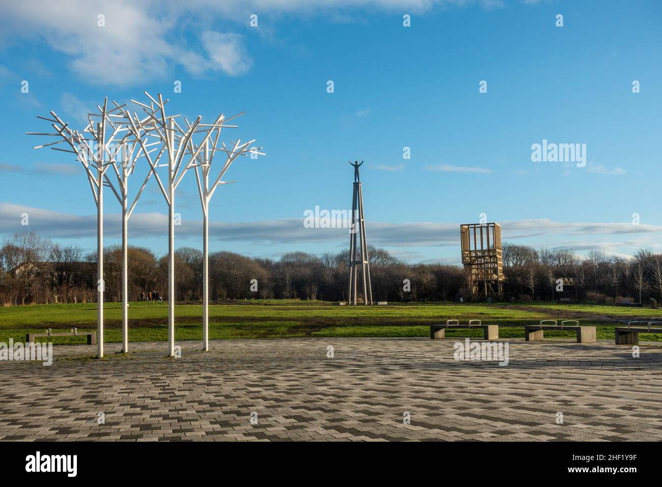 Artworks including sculptural trees, the Hope Sculpture by Steuart Padwick and The Tur lookout platform in the Cuningar Loop, Glasgow. Stock Photo