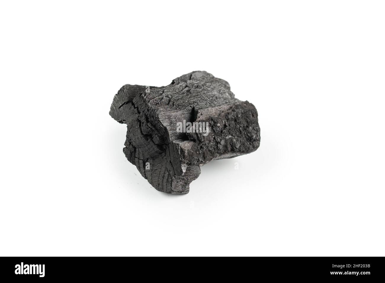 Black oak coal isolated on a white background. Stock Photo