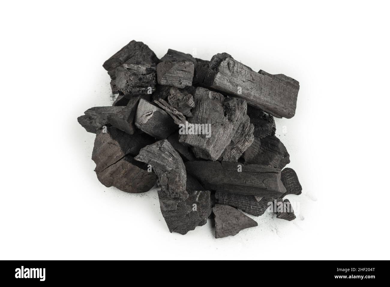 Black oak coal isolated on a white background. Stock Photo