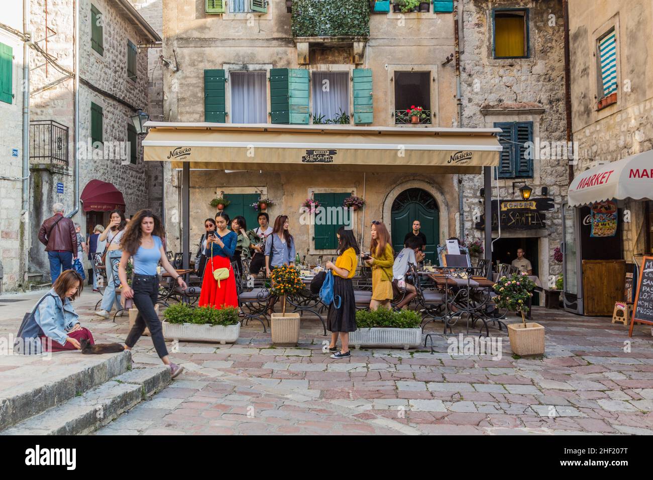 KOTOR, MONTENEGRO - JUNE 1, 2019: Open air restaurant in the Old Town