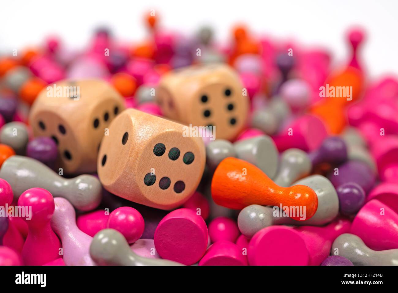 Lots of colorful game pieces and dice for board games Stock Photo Alamy