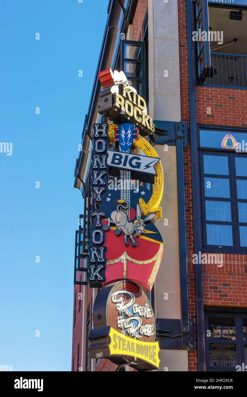 Nashville, Tennessee, USA - November 7, 2021: Old town Nashville with a neon sign advertising a restaurant. Stock Photo