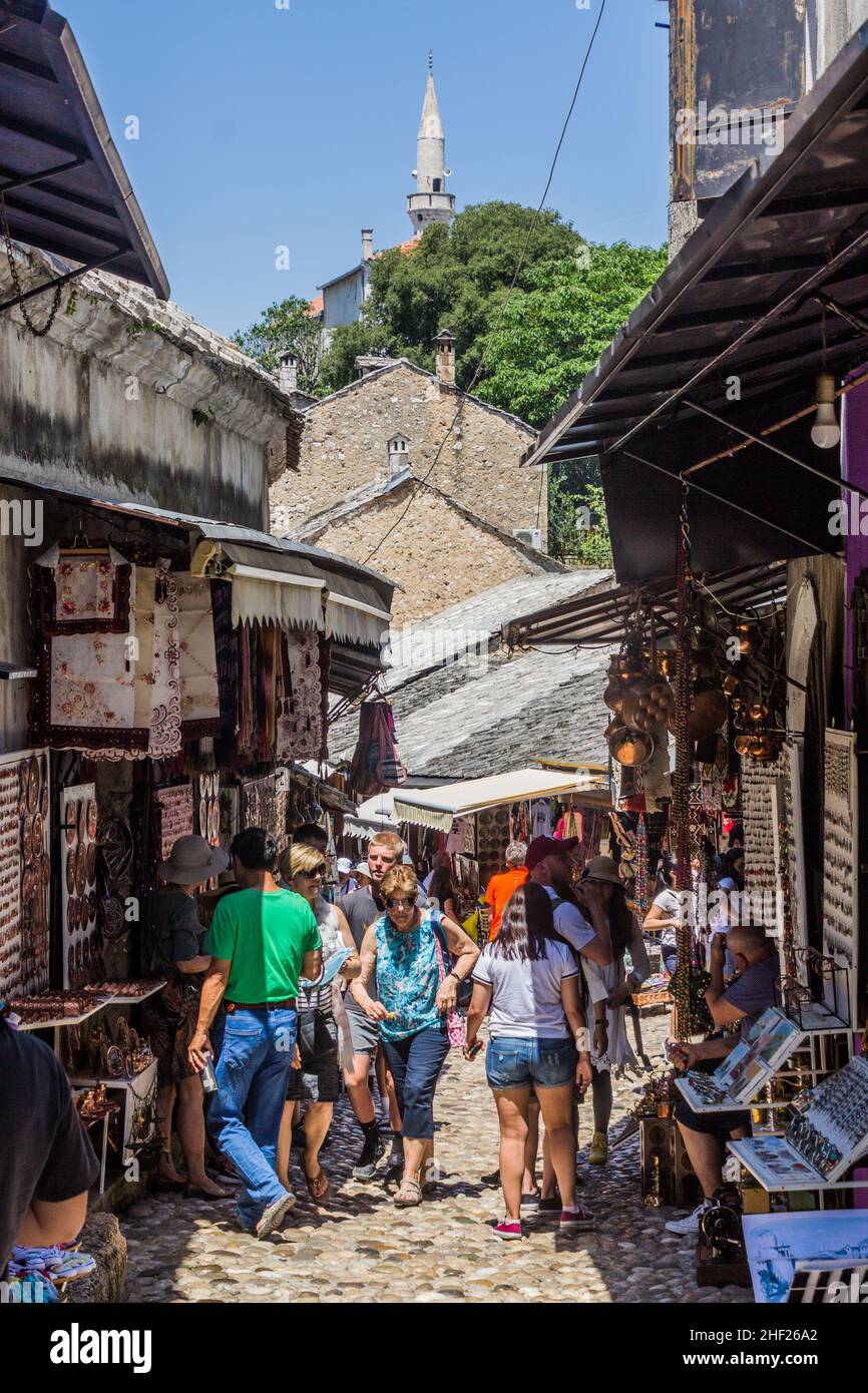 MOSTAR, BOSNIA AND HERZEGOVINA - JUNE 10, 2019: Pedestrian street with souvenir stalls in Mostar. Bosnia and Herzegovina Stock Photo