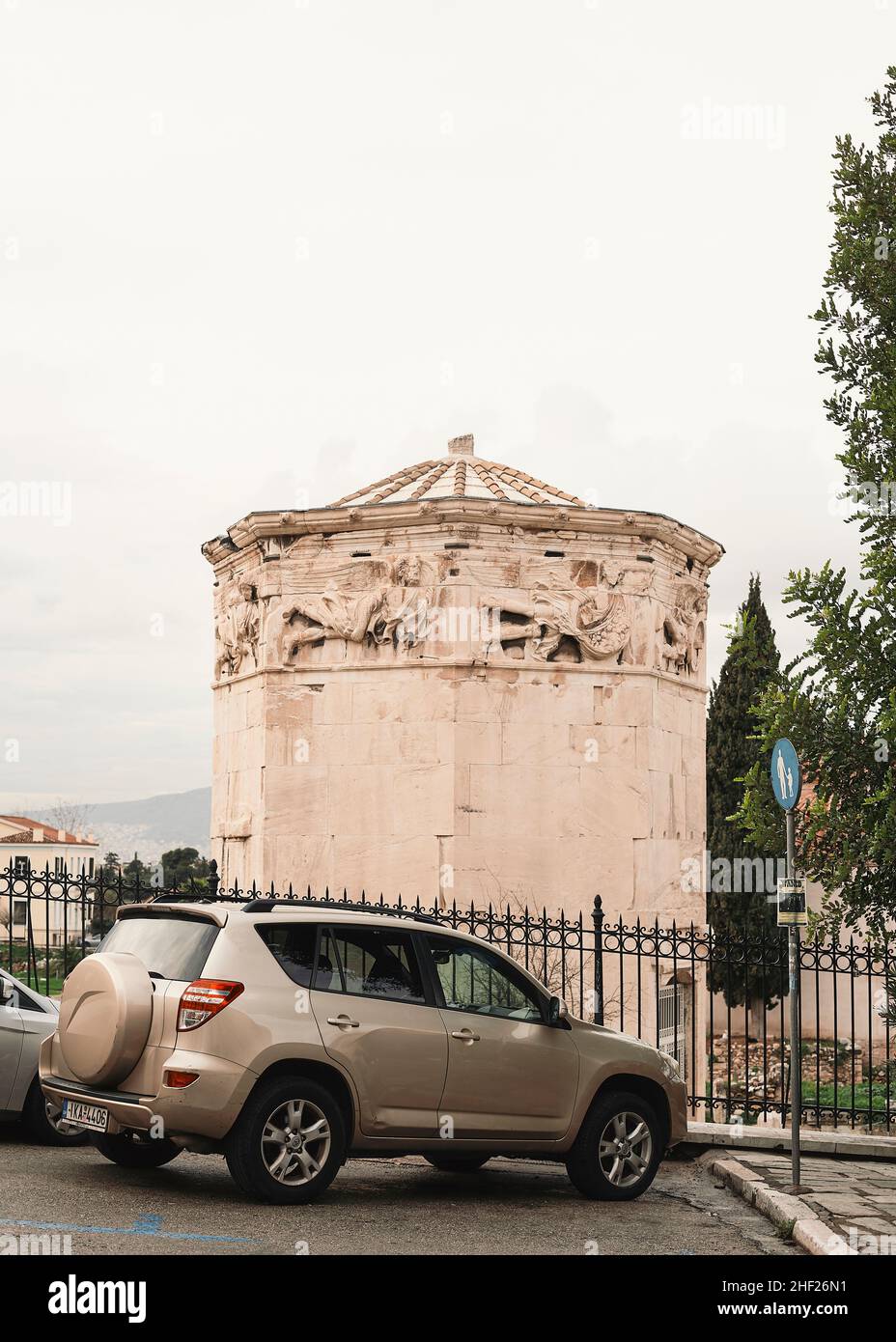 Tower of the Winds in the Roman Agora archaeological site in the city center of Athens, Plaka and car parking Stock Photo