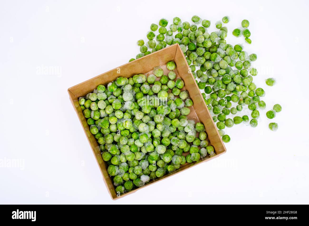 Frozen green peas, preservation of vitamins and vegetables. Photo Stock